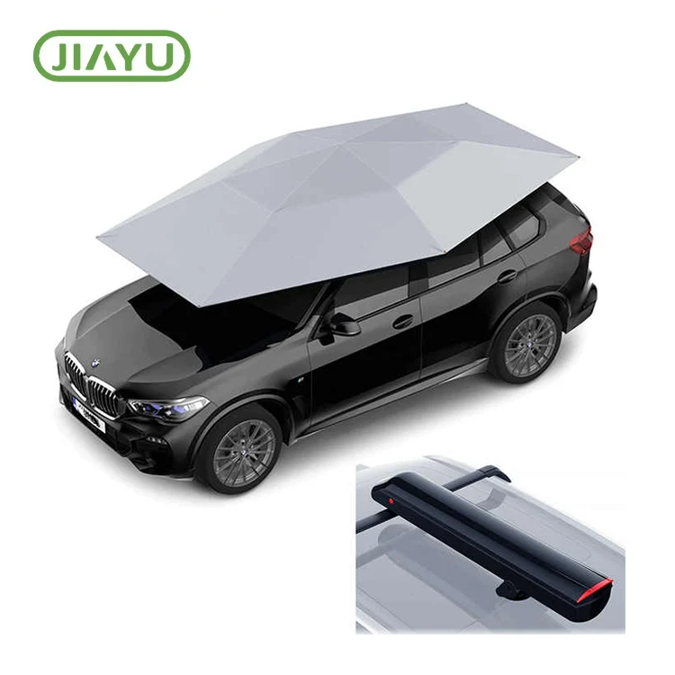In che modo un ombrellone automatico per tenda a distanza protegge i veicoli dal sole e dai detriti esterni?